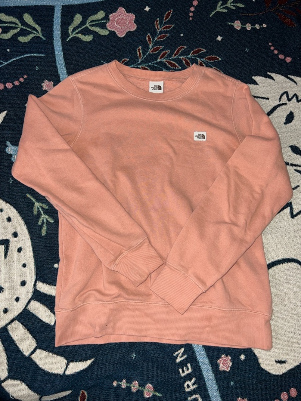 The North Face woman’s Dusty Pink Crewneck Sweatshirt